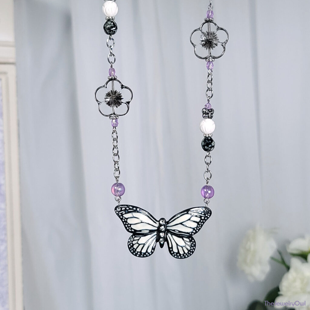 Asymmetrical Butterfly and Flowers Chain Necklace by The Jewelry Owl (thejewelryowl)