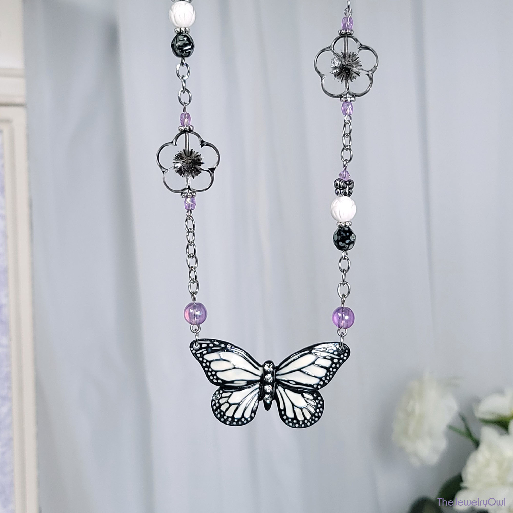 Asymmetrical Butterfly and Flowers Chain Necklace by The Jewelry Owl (thejewelryowl)