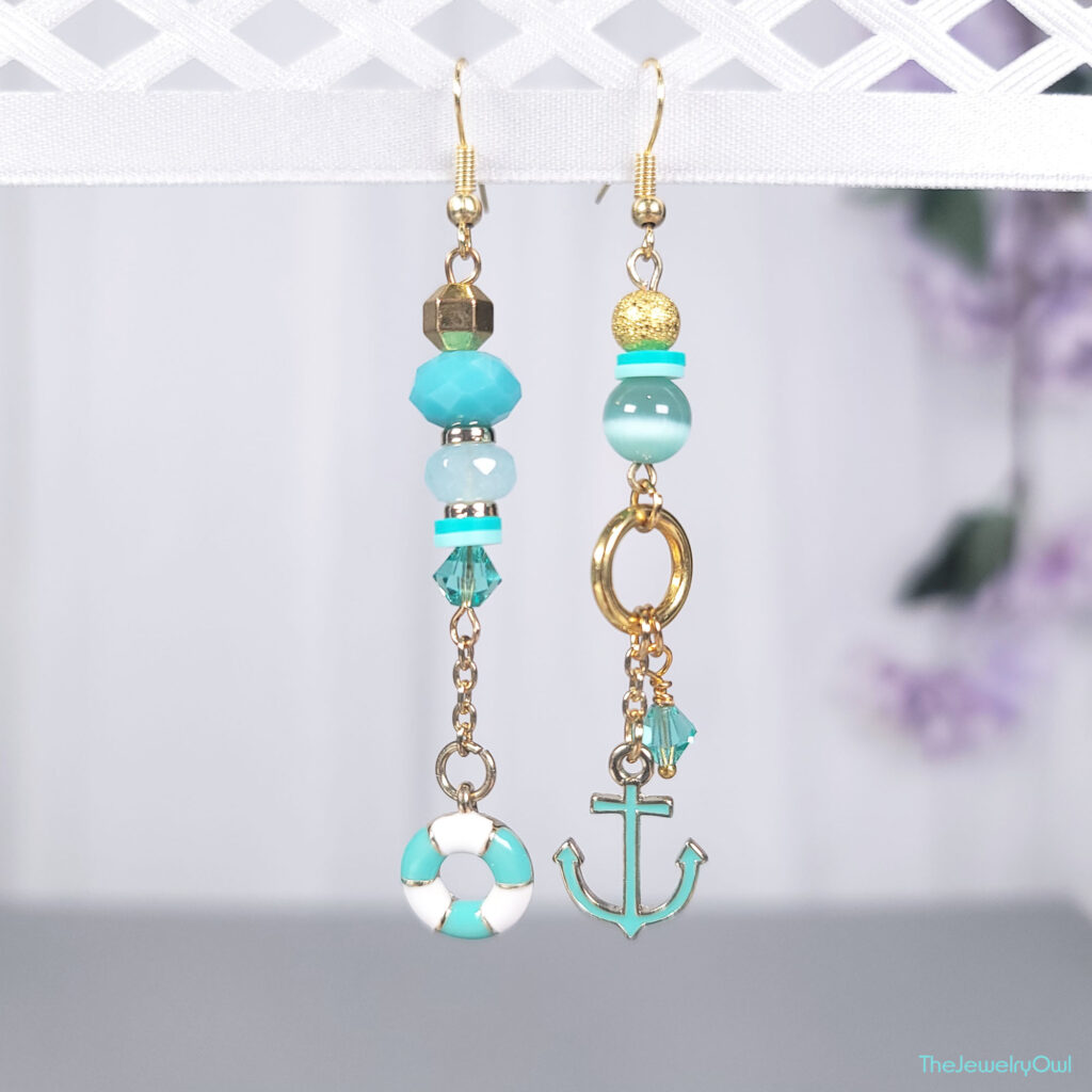 Teal Blue Nautical Mismatched Dangle Earrings by The Jewelry Owl (thejewelryowl)