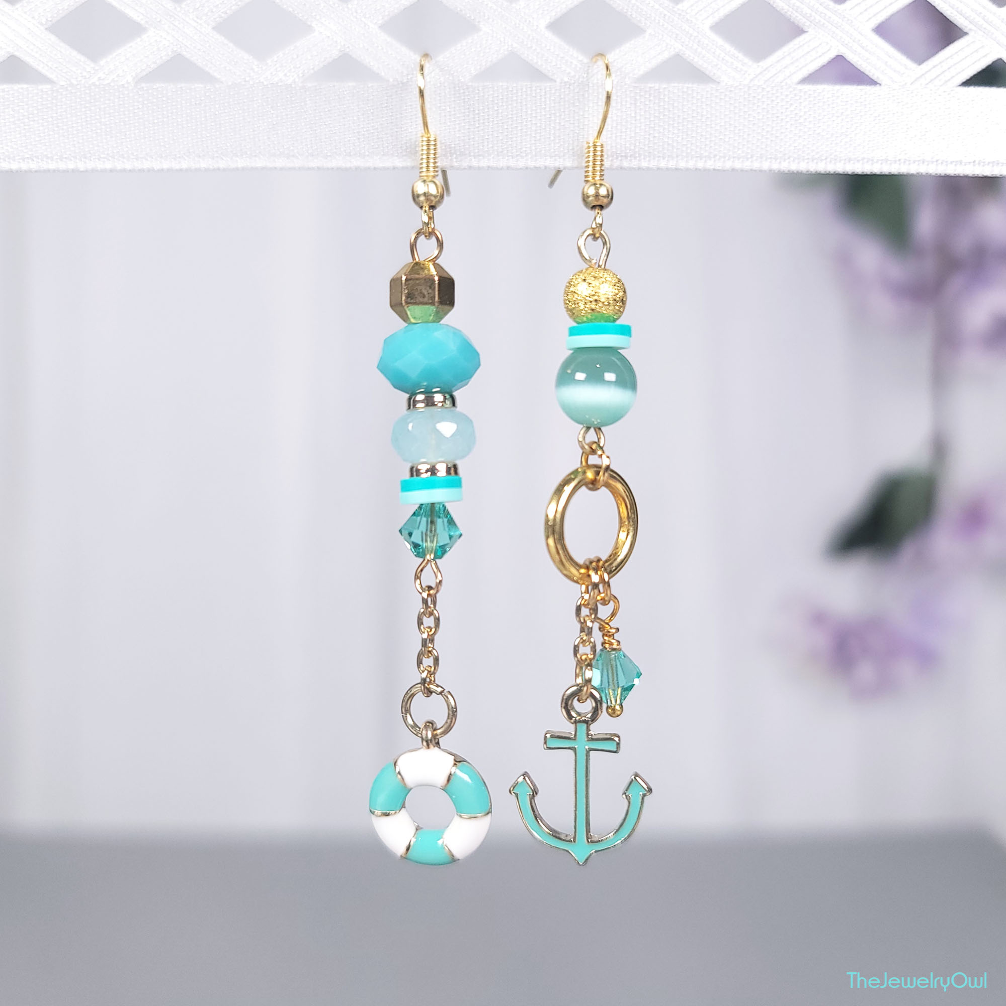 Teal Blue Nautical Mismatched Dangle Earrings by The Jewelry Owl (thejewelryowl)